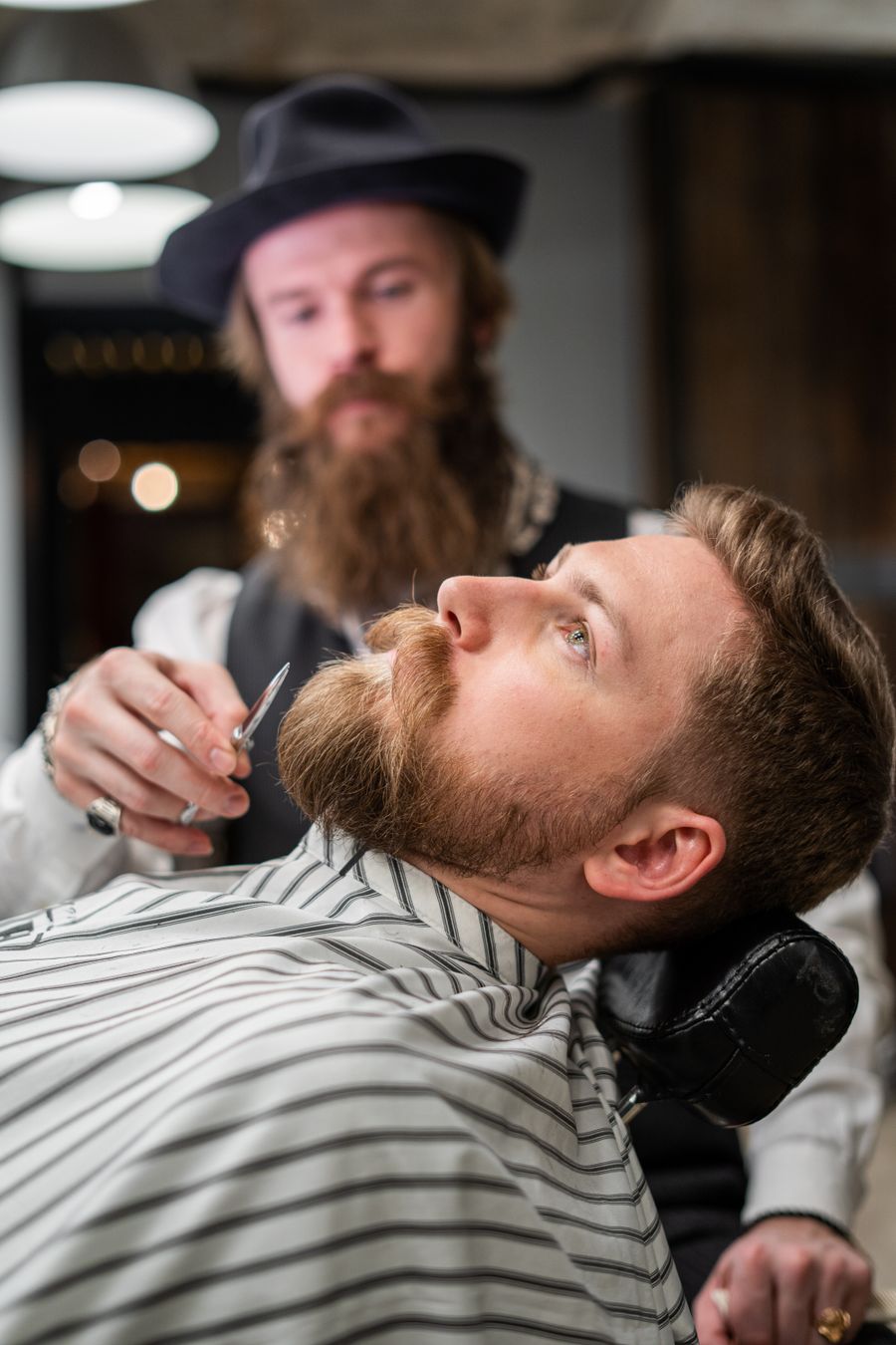 Barber at work in a barbershop